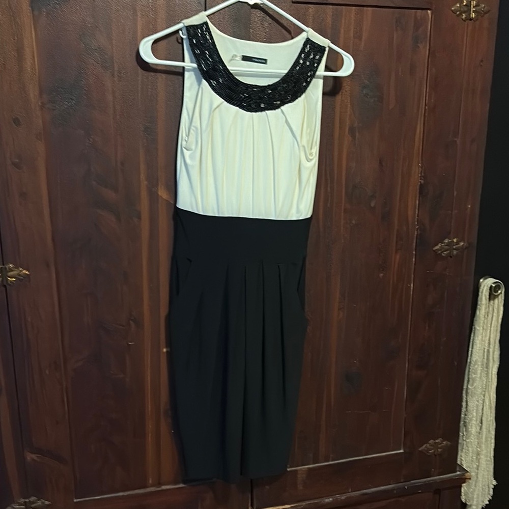 Elegant Black and White Dress with Beaded Neckline